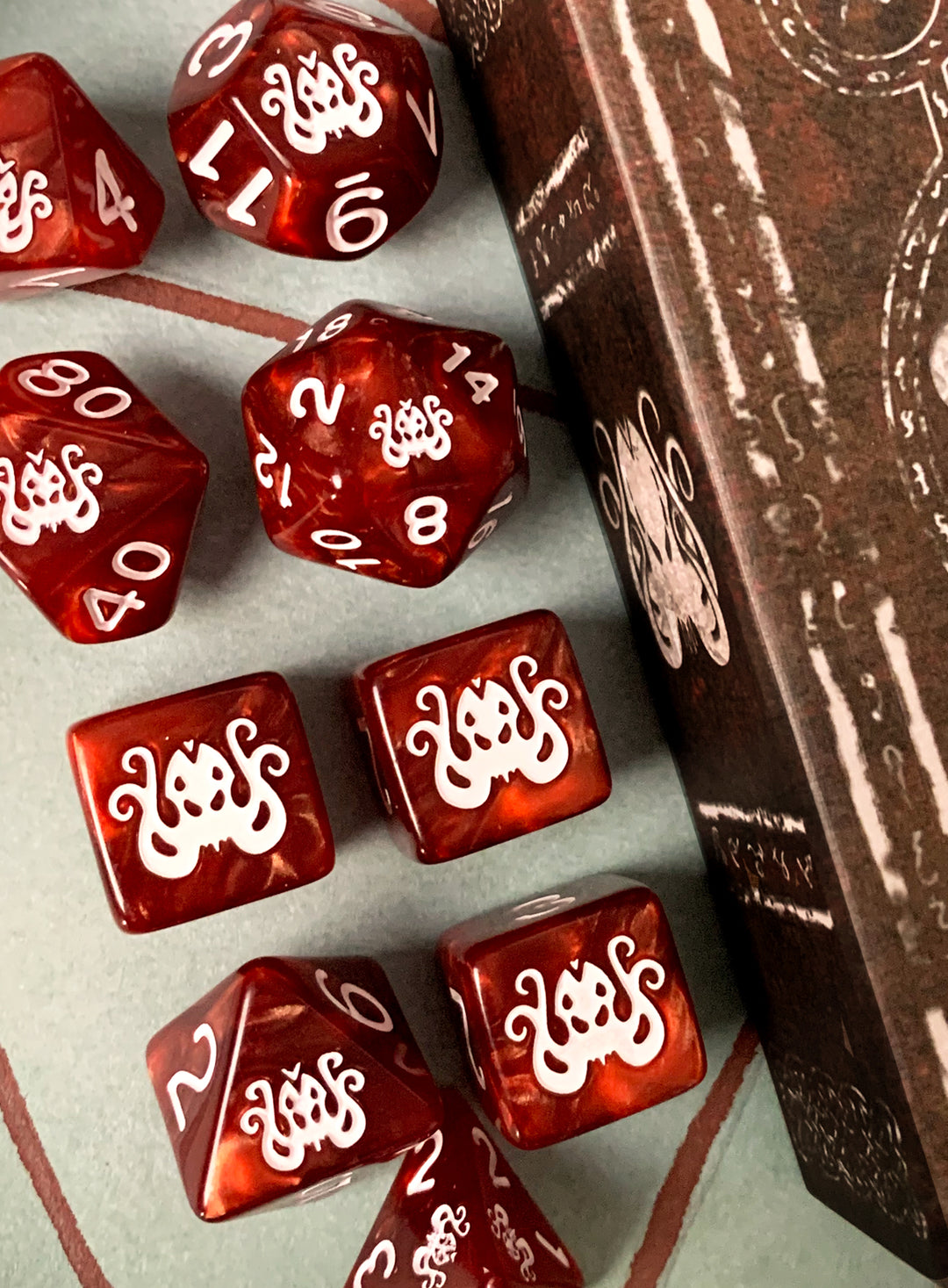 The Brand of Cthulhu Dice - Bone White on Eldritch Red Polyhedral Set