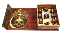 The red and blue "Blood and Magic" edition of the Necronomicon Dice