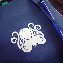 Cthulhu sticker on gaming notebook
