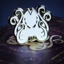 The Brand of Cthulhu gold collectible pin with white enamel