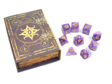 the star of azathoth polyhedral dice set with box on white