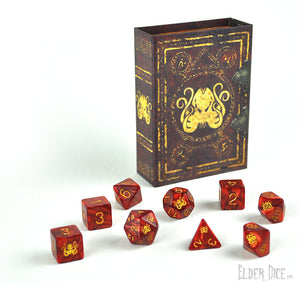 The Brand of Cthulhu polyhedral dice set pictured with the spellbook box