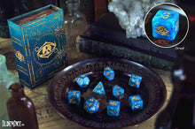 blue swirl Eye of Chaos polyhedral dice set with spellbook grimoire