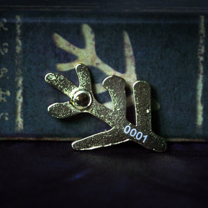 Back of Elder Sign gold pin