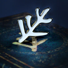 The Elder Sign gold collectible pin with white enamel