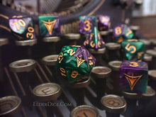 The Yellow Sign polyhedral Elder Dice in the Masked Purple and Green edition