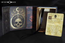 red and black Mark of the Necronomicon deck box with lore card