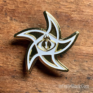 Gold and white enamel Astral star pin