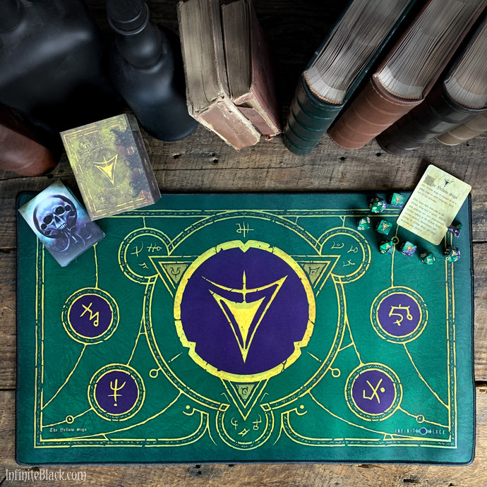 The Yellow Sign (Masked purple and green edition) premium stitched-edge playmat