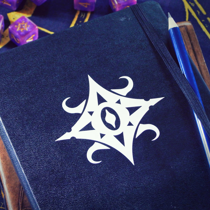 Star of Azathoth sticker on journal